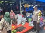 Polsek Pelangiran Tingkatkan Kewaspadaan Pasar Tanjung Simpang Lewat Sambang Bhabinkamtibmas