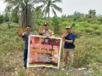 Tingkatkan Kewaspadaan Karhutla, Bhabinkamtibmas Polsek Pelangiran dan MPA gencar Patroli dan Sosialisasi Lahan di Desa Rotan Semelur