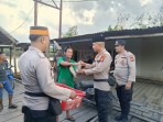 Ramadhan Peduli, Polsek Enok Bagikan Takjil ke Warga Kel.Enok