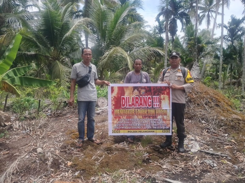 Polsek Pelangiran Gencar Sosialisasikan Larangan Membakar Lahan, Bhabinkamtibmas Jadi Ujung Tombak Kesadaran Hukum Masyarakat