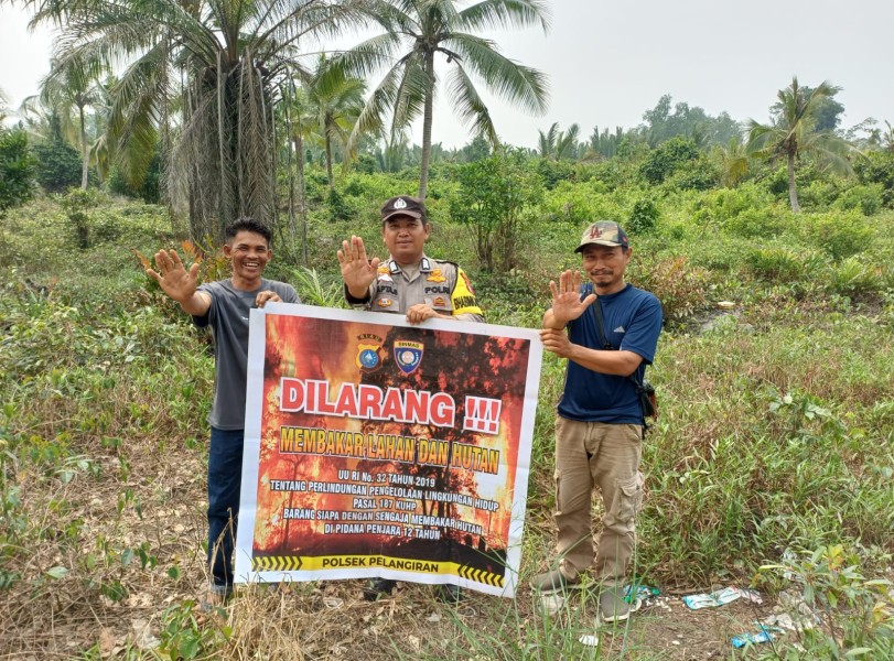 Tingkatkan Kewaspadaan Karhutla, Bhabinkamtibmas Polsek Pelangiran dan MPA gencar Patroli dan Sosialisasi Lahan di Desa Rotan Semelur