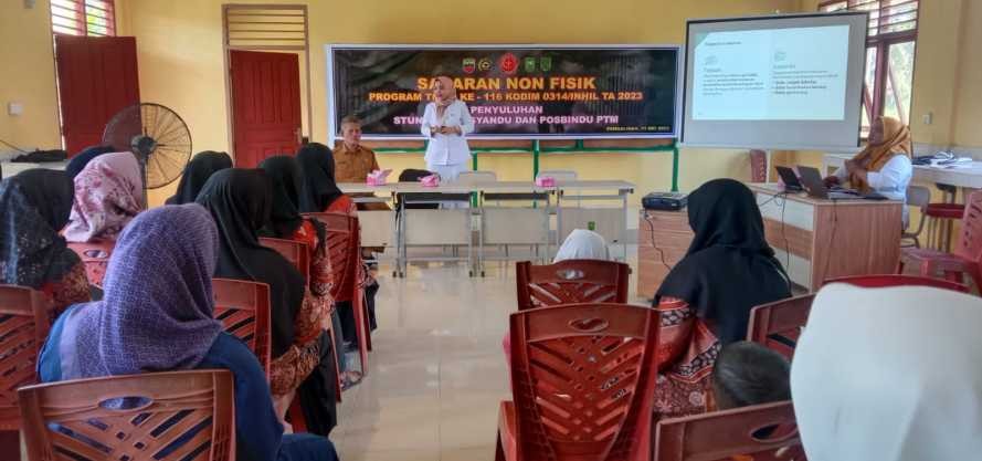 Satgas TMMD Bersama UPT Puskesmas Keritang Lakukan Penyuluhan Posyandu dan PTM